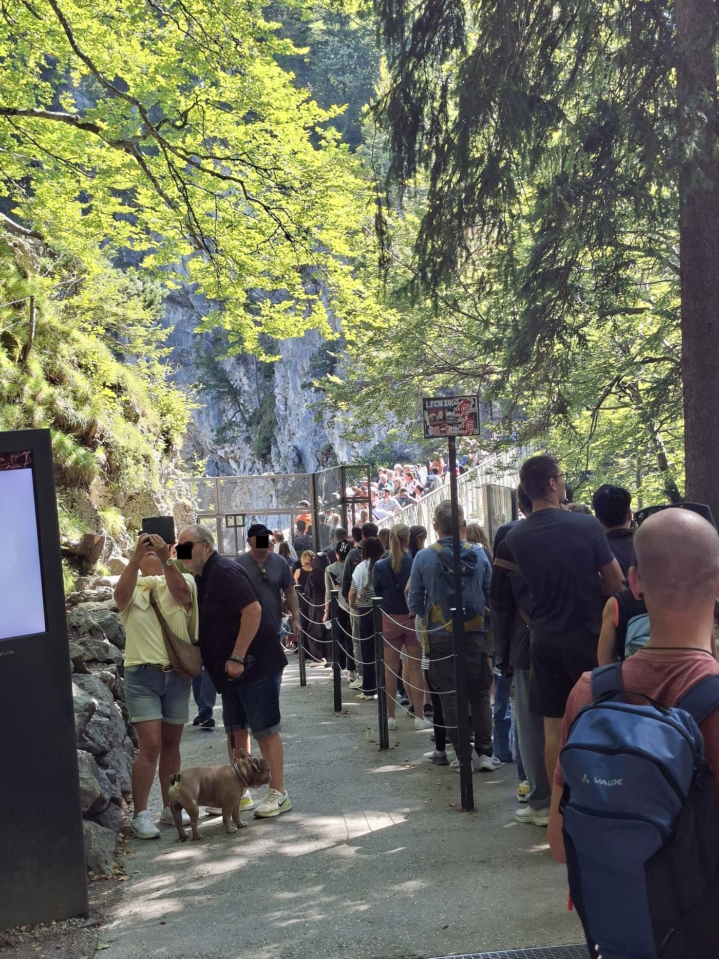 Visitors queue on Marienbrücke on a summer day