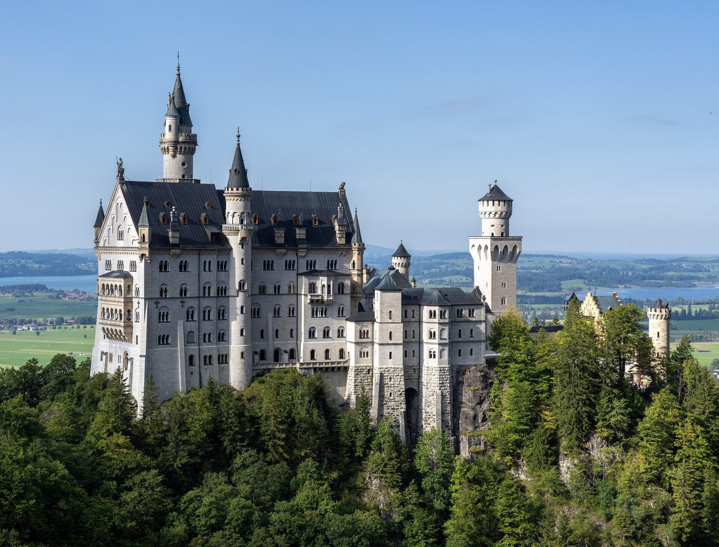 Neuschwanstein Castle from the south with the Forggensee behind
