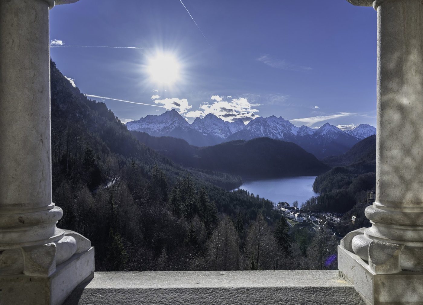 Alpsee and Alps through a Neuschwanstein Castle window